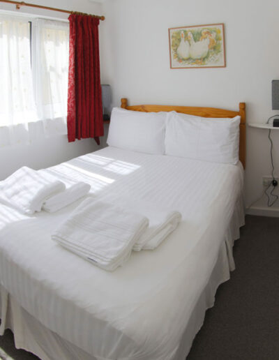 Ground floor double bedroom at Harbour View self-catering accommodation in Brixham, Devon.