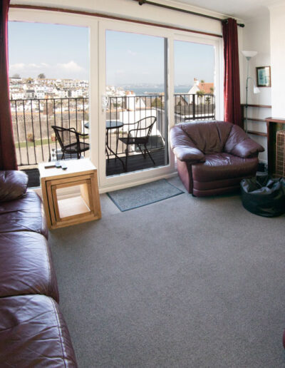 First floor lounge at Harbour View self-catering accommodation in Brixham, Devon.